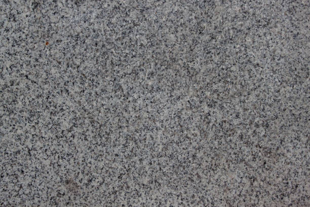 istock Gray grainy texture with marble chips. Used as a background. 959474854
