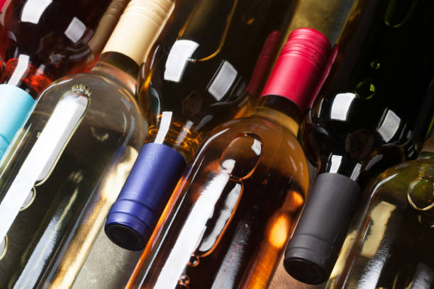 istock Red, rose and white wine bottles 959479146