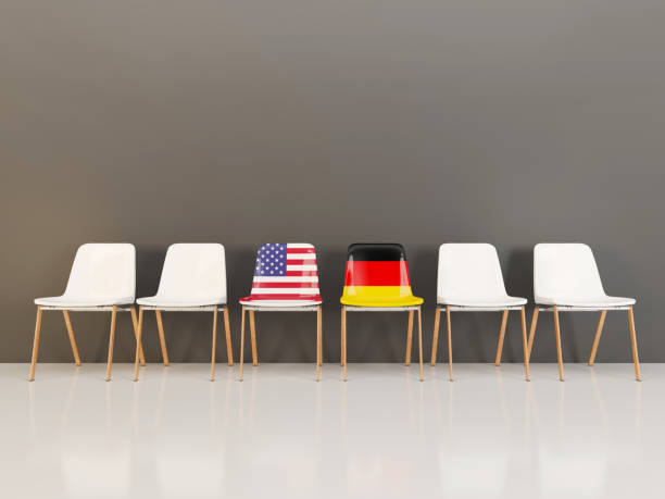 istock Chairs with flag of usa and germany 959482364