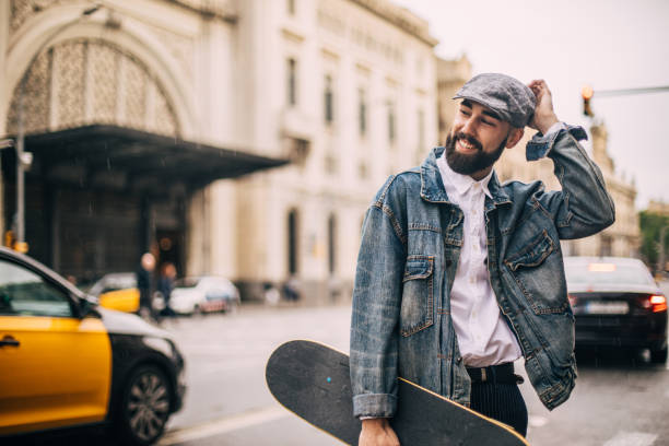 istock Man with skateboard on the street 959483482