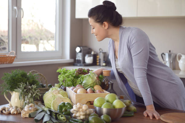 istock woman cooking in the kitchen 959489268