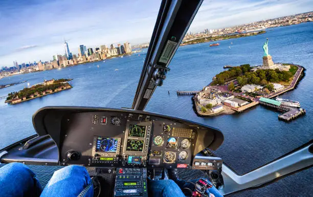 Cockpit view of a flight over Statue of Liberty in Liberty Island, New York. USA