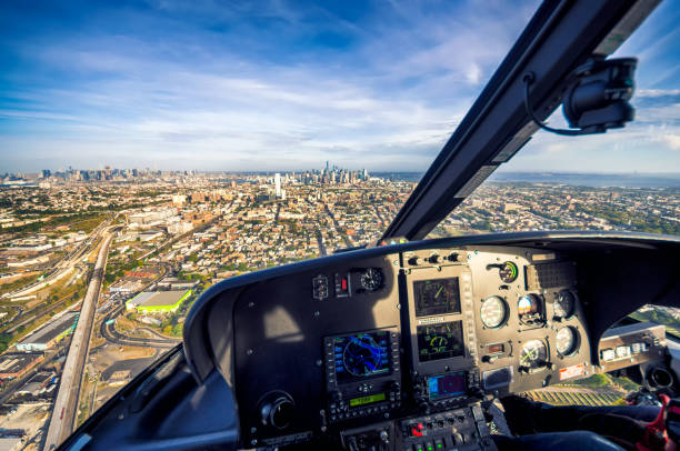 istock helicopter cockpit view flying to Manhattan. 959491706