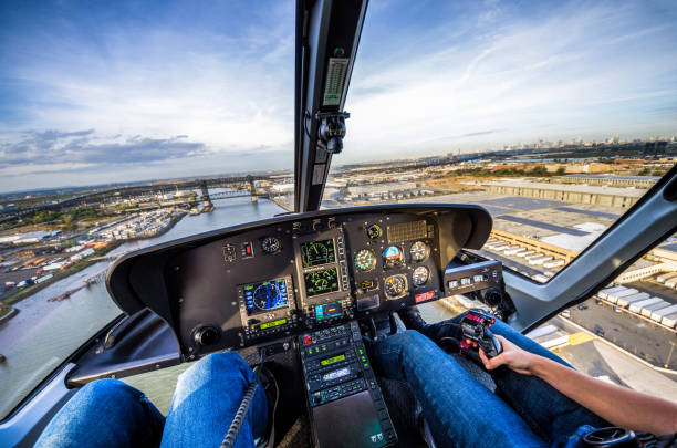 istock helicopter cockpit view flying over Newark bay 959491708
