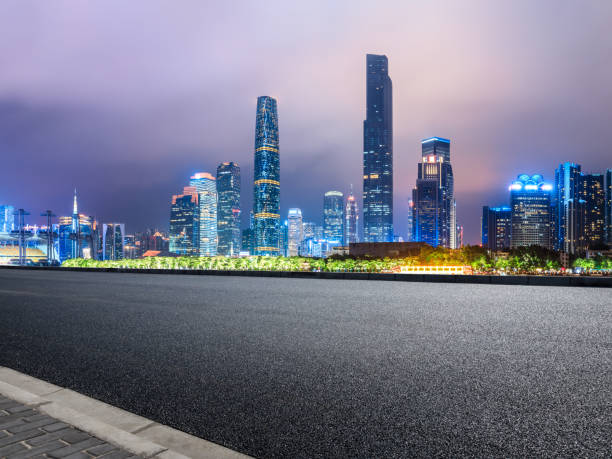 istock empty asphalt road and modern city skyline in Guangzhou at night 959493154