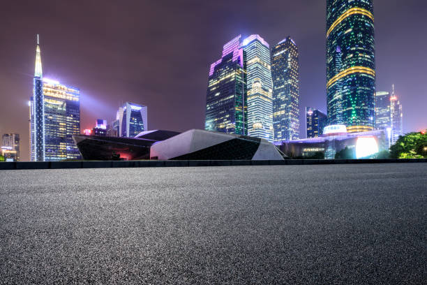 istock empty asphalt road and modern city skyline in Guangzhou at night 959493576