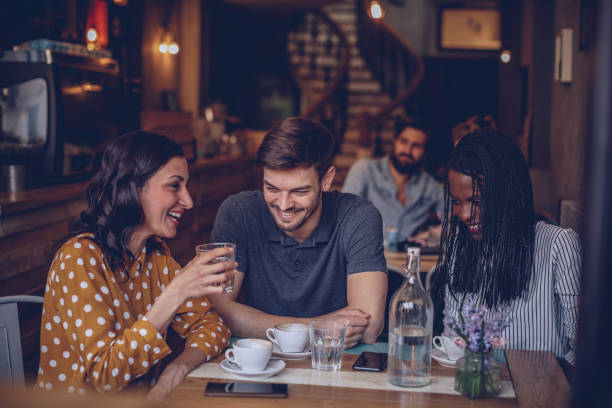 istock Friends having fun at coffee shop 959493948