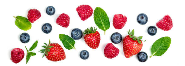 istock Various fresh forest berries isolated on white background, top view. Berry border frame. Flat lay. 959495002