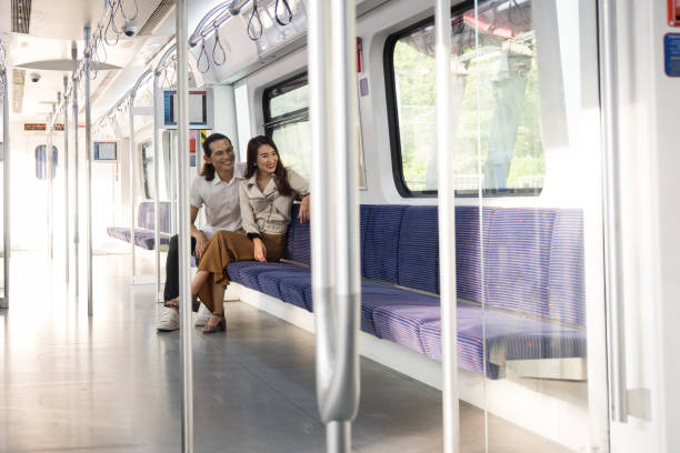 istock Young couple travelling on the local train 959495048