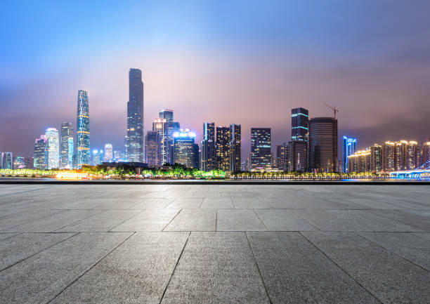 istock empty square floors and modern city skyline in Guangzhou at night 959502534