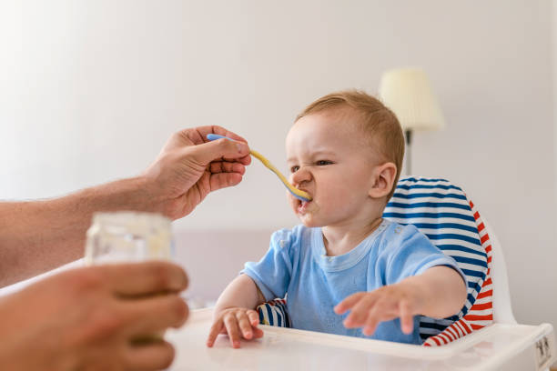 istock Feeding In The Living Room 959502564