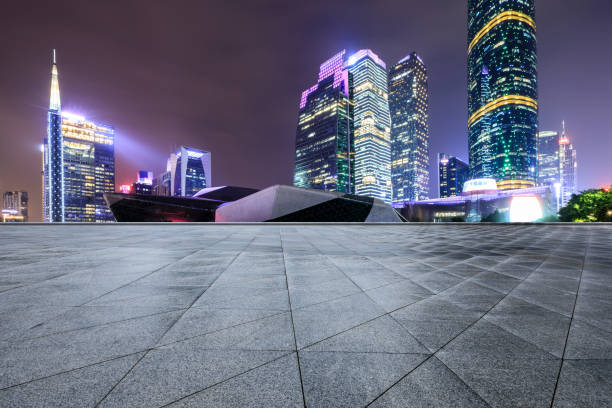 istock empty square floors and modern city skyline in Guangzhou at night 959503082