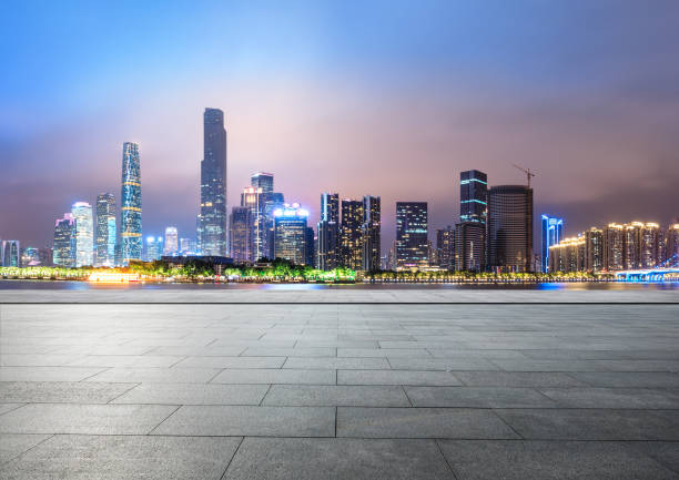 istock empty square floors and modern city skyline in Guangzhou at night 959503880