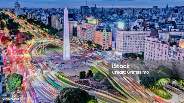 Argentina Buenos Aires Downtown With Traffic Cars At Night Arround The Obelisco Stock Photo - Download Image Now