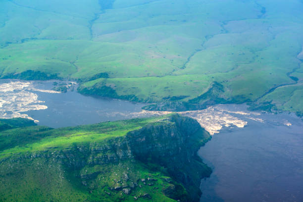 Aerial View of the closest spot at the famous Livingstone Falls at the lower Congo River - this is the last navigable point before the Livingstone rapids make the river impassable for a long stretch upriver. The falls are named for the explorer David Livingstone and are providing a difference in altitude of 270 meters over a distance of 350 km. Congo river is the deepest river of the world and the largest river in Africa. \n\nNOTE - this are the ONLY images of the full Livingstone Falls at ALL stock agencies worldwide.