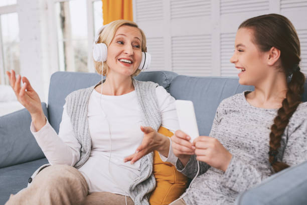 istock Cheerful woman communicating with her daughter 959527258