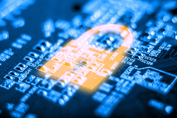 Glowing lock icon on the electronic Board with a microchip. Concept of information security technology stock photo