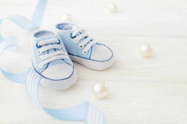 baby shoes close-up of baby shoes baby boys stock pictures, royalty-free photos & images
