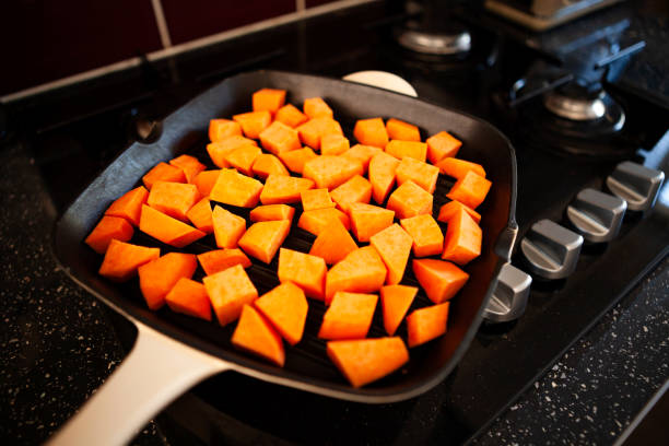 Sweet potato being cooked in a griddle pan/broiler
