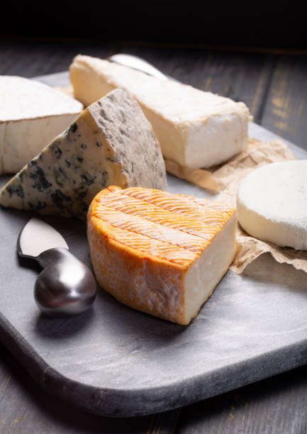 istock French cheeses plate in assortment, blue cheese, brie, munster, soft goat cheese 959531826