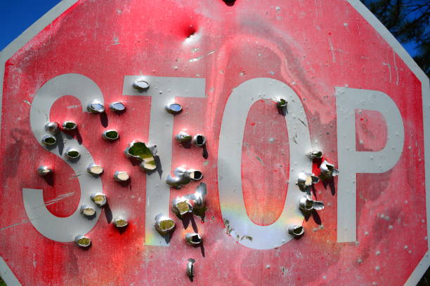 Stop Sign Bullet Inmate 60+ Sign Bullet Hole Stop Road Sign Stock Photos, Pictures & Royalty ...