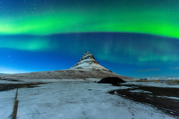 istock Aurora Borealis or northern light above kirkjufell mountain in iceland 959536632