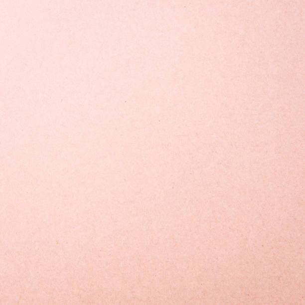 istock Craft paper pink or rose gold textured abstract background 959546448