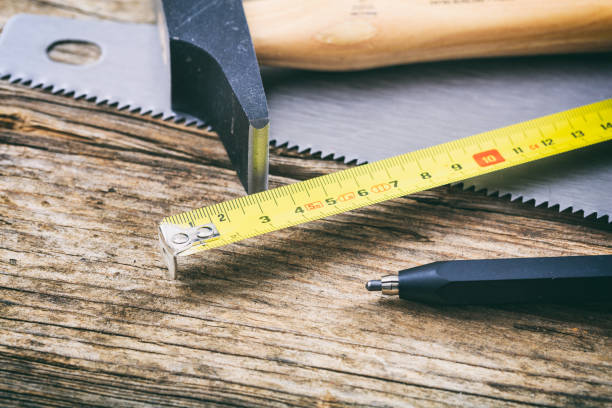 istock Hand tools and nails on a wooden bench 959547488