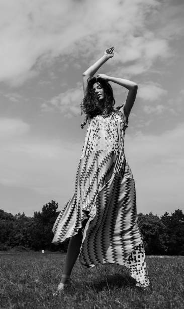 istock Young woman enjoying sunny day in summer 959547914