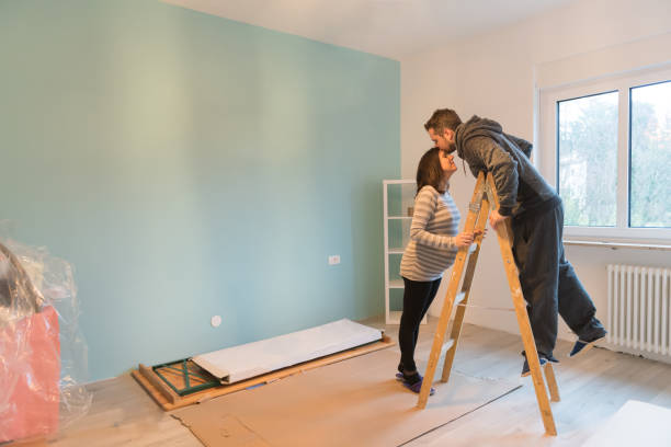 istock Pregnant couple in a new home 959551264