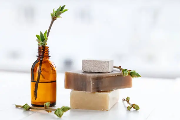 Natural soap for SPA procedures, with oils on a light background. Copy space