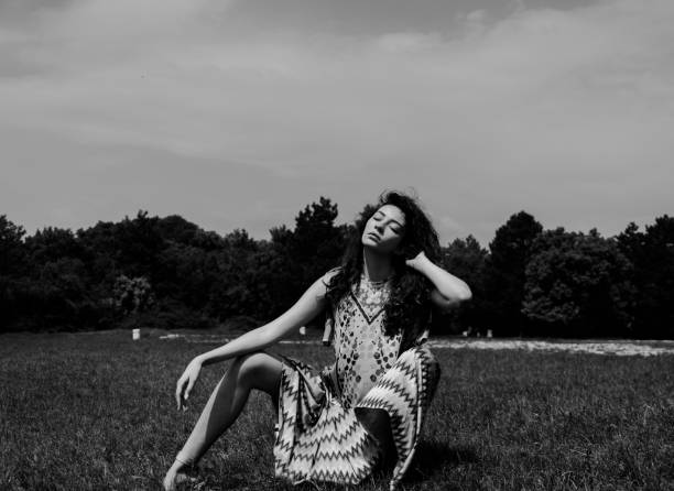 istock Young woman enjoying sunny day in summer 959551300