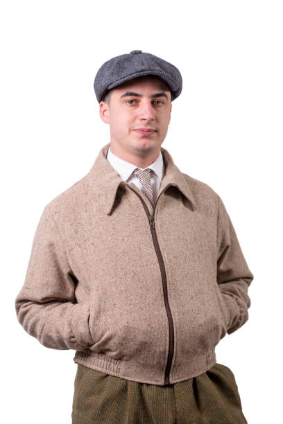 istock a young man in vintage clothes with hat, 1930 style, on white 959551322