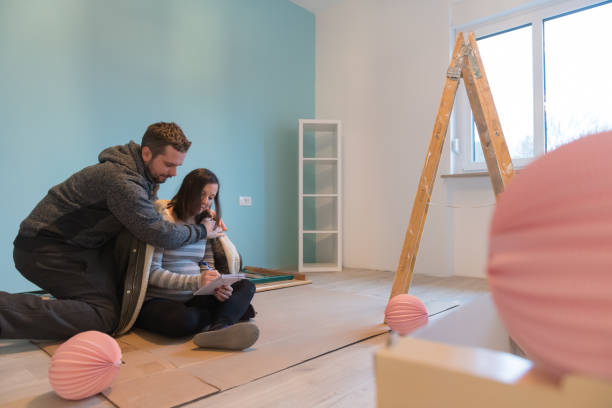 istock Pregnant couple in a new home 959551326