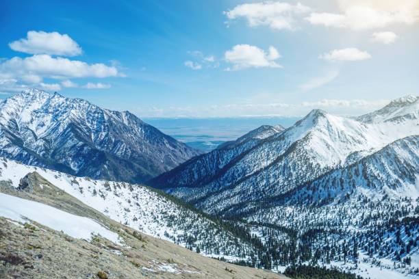 landscape of snow-capped peaks of the rocky mountains in sunny weather. concept of nature and travel - switzerland forest storm summer imagens e fotografias de stock