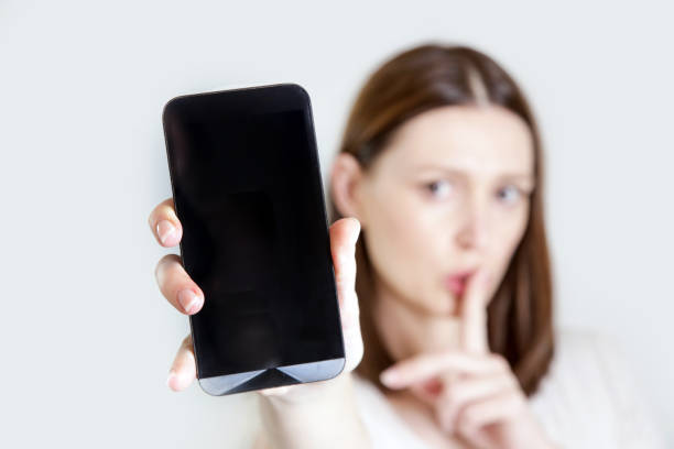 Please silence your cell phone stock photo