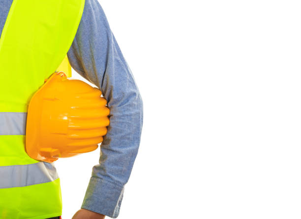 istock Man with safety equipment on white background 959565654