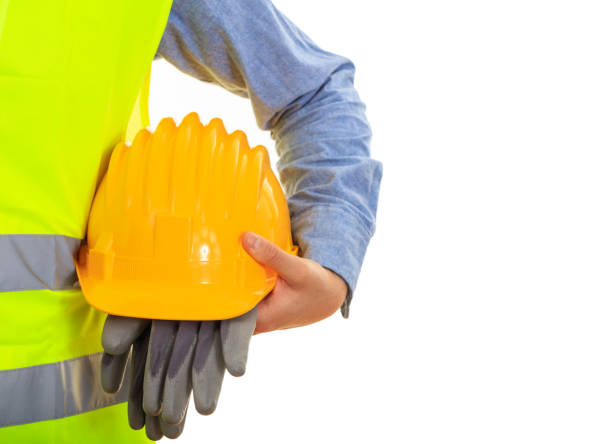 istock Man with safety equipment on white background 959565658