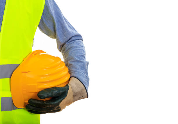 istock Man with safety equipment on white background 959565744
