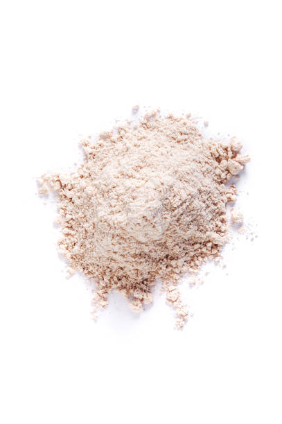 istock Handful of flour on a white background. Isolated. 959566470