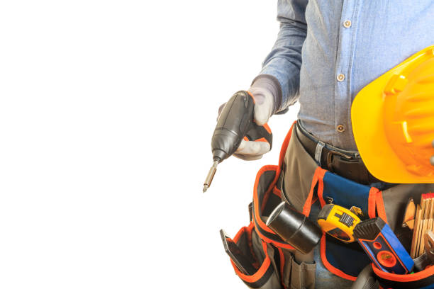 istock Worker holding an electric screwdriver on white background 959568162