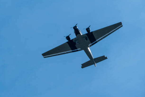 istock In the sky flies an ancient propeller plane 959575590