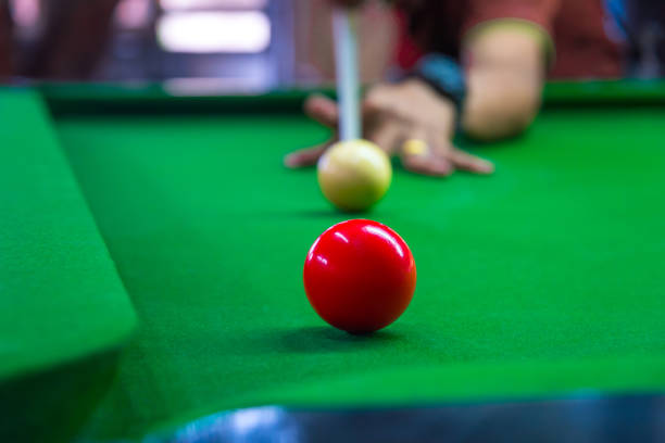 istock Snooker is aim the cue ball focus on red ball on the table 959577388