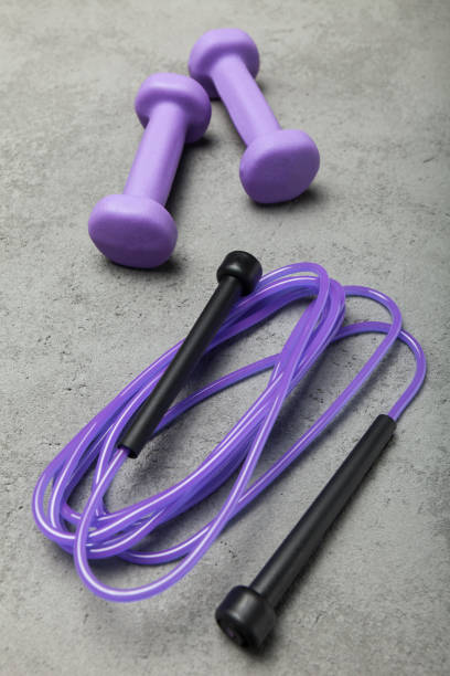 istock Fitness equipment on a concrete background 959579796