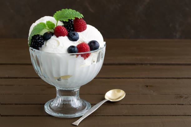 istock Ice cream balls in a glass vase. 959581500