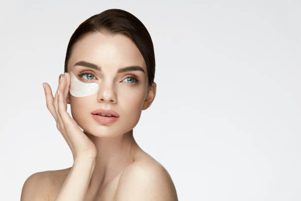 istock Patch Under Eye. Beautiful Woman With Under Eye Mask On Face 959584504
