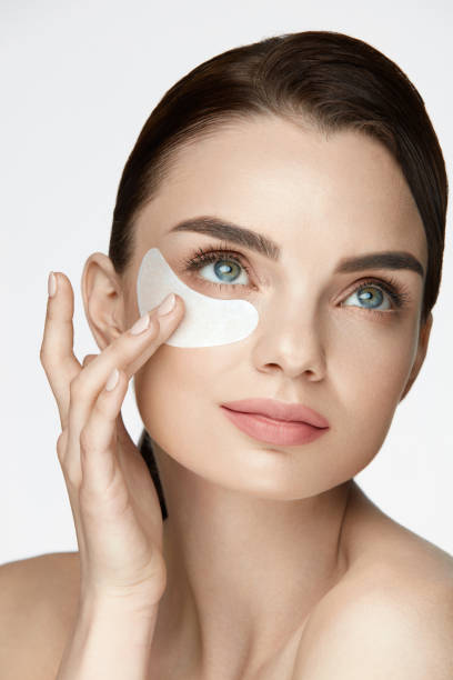 istock Patch Under Eye. Beautiful Woman With Under Eye Mask On Face 959584602