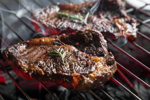 istock Pieces of marbled beef on the grill 959584806