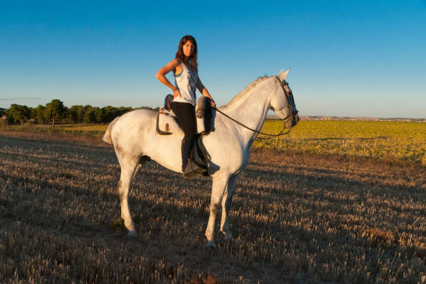istock woman on horseback 959584934