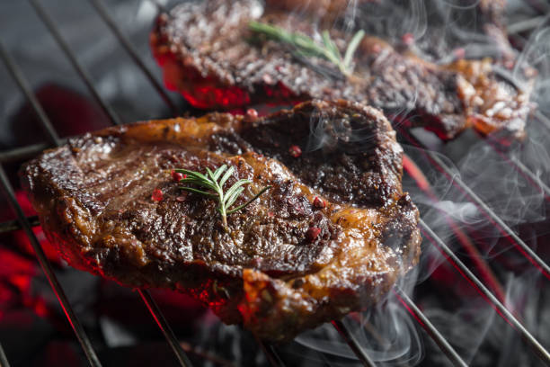 istock Pieces of marbled beef on the grill 959584986